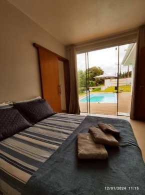 Quiosque com piscina e vista